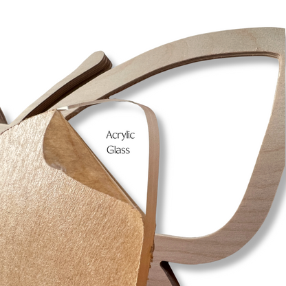 Close-up of wood mosaic frame with 'Acrylic Glass' 