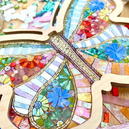 Colorful glass-on-glass mosaic art piece with glass flowers and wooden frame by Sharra Frank Mosaics.