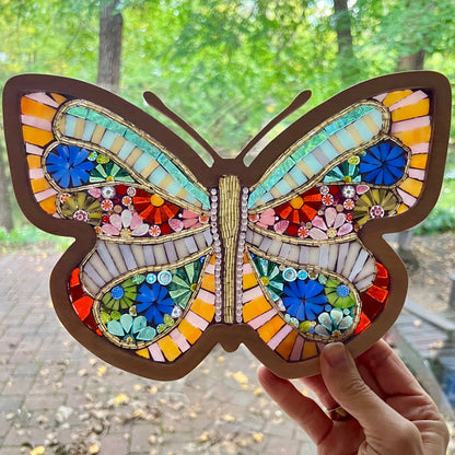 Colorful glass-on-glass mosaic art piece with glass flowers and wooden frame by Sharra Frank Mosaics.