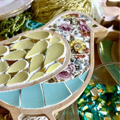 Mosaic Bird with heirloom china, beads, gold and glass pearls by Sharra Frank.