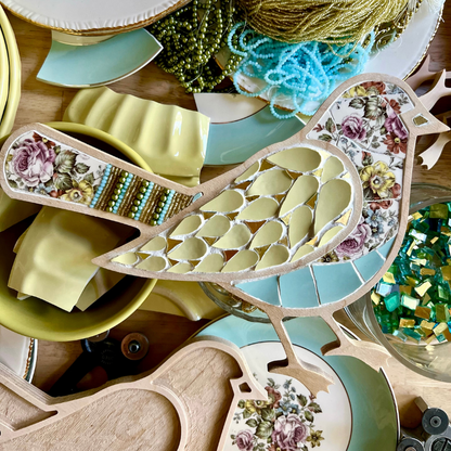 Mosaic Bird with heirloom china, beads, gold and glass pearls by Sharra Frank.