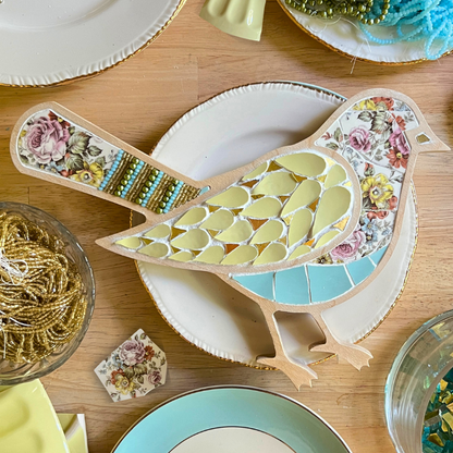 Mosaic Bird with heirloom china, beads, gold and glass pearls by Sharra Frank.