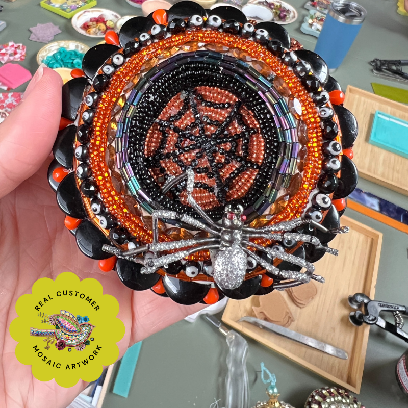 Beaded mosaic ornament with rhinestones, vintage findings and beads.