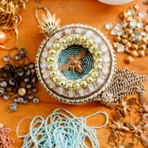 Beaded mosaic ornament with rhinestones, vintage findings and beads.