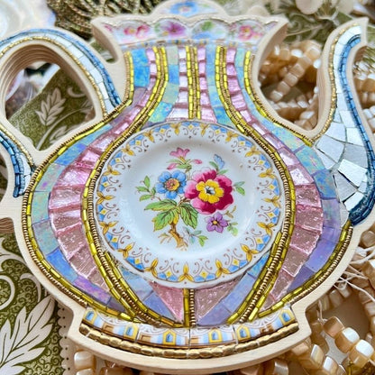 Mosaic Teapot Artwork by Sharra Frank made with glass, beads and fine china plates.
